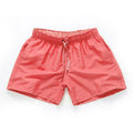 Men's straight-leg beach shorts in polyester fabric, shown in multiple colour options.