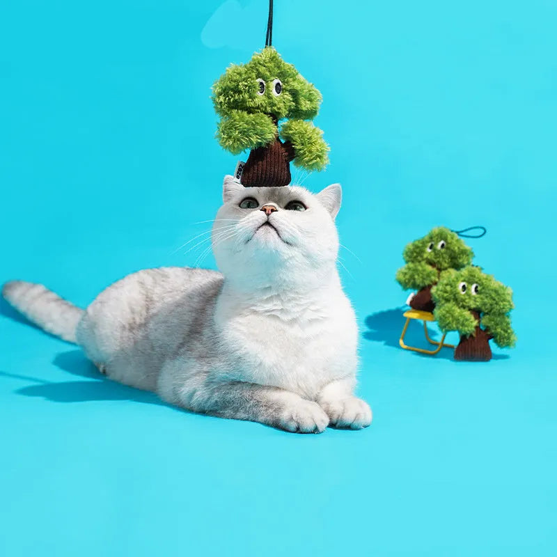 Pine tree shaped fabric cat toy pendant with catnip, shown in three sizes.