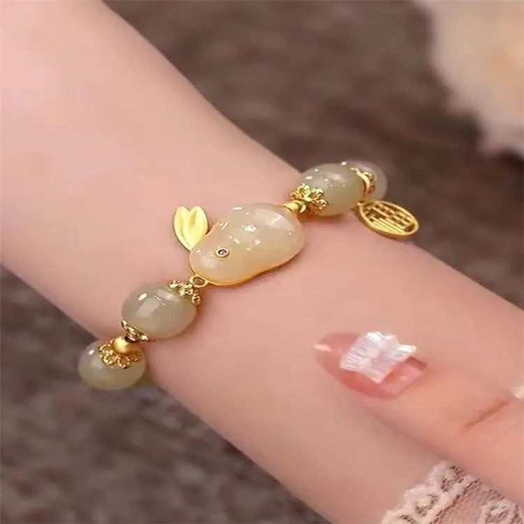 Green electroplated Jade Hare bracelet for women with Chinese style zodiac design and lily elements