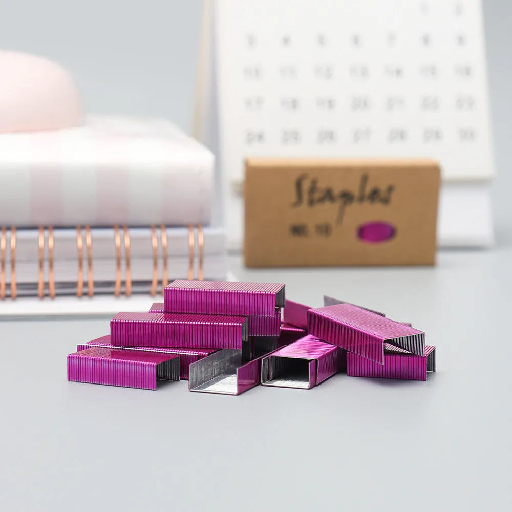 Box of 1000 metal office staples in four colour options: black, purple, rose gold and rose red