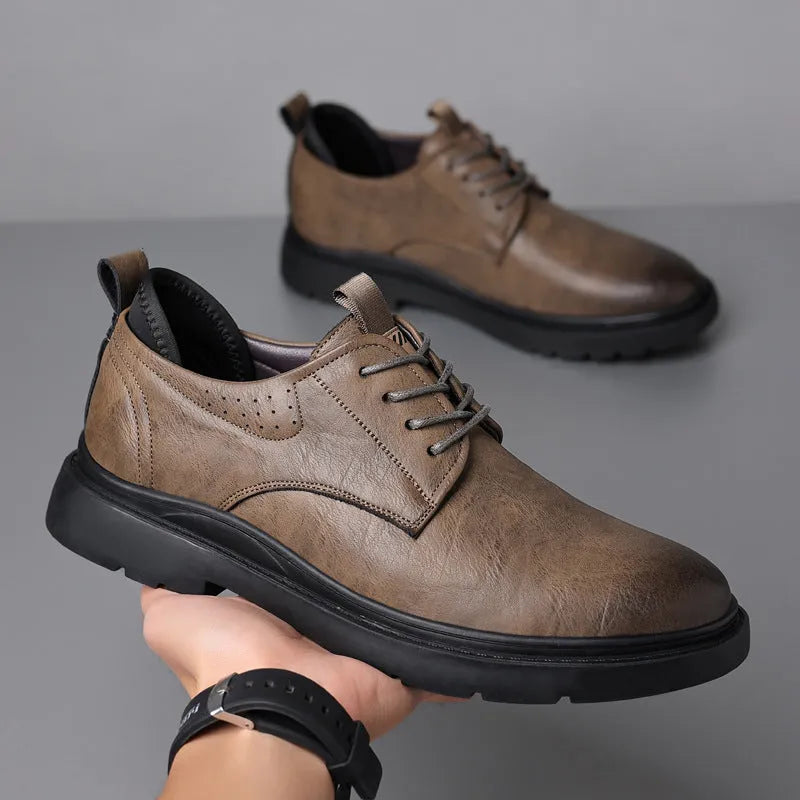 Men's black and brown leather business shoes with cowhide upper and rubber sole.