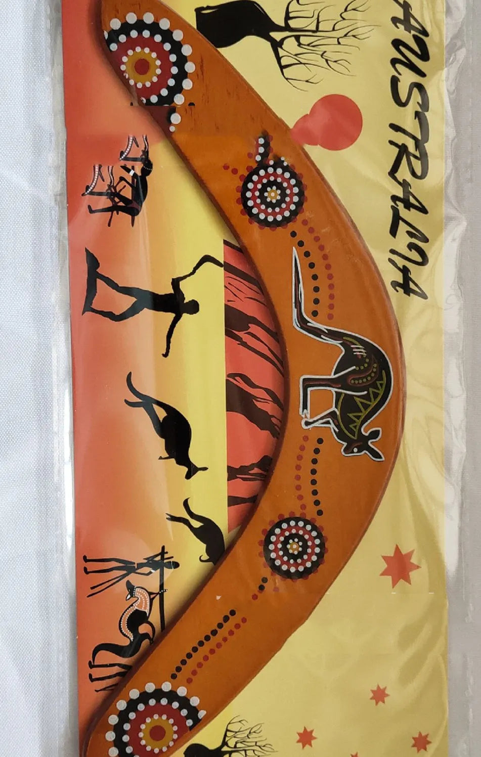 Wooden V-shaped revolving dart in black with flying back mechanism and anime kangaroo image