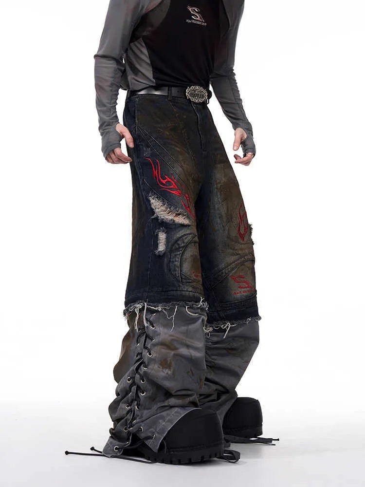Men's light blue wide-leg jeans with detachable legs shown in a retro style.