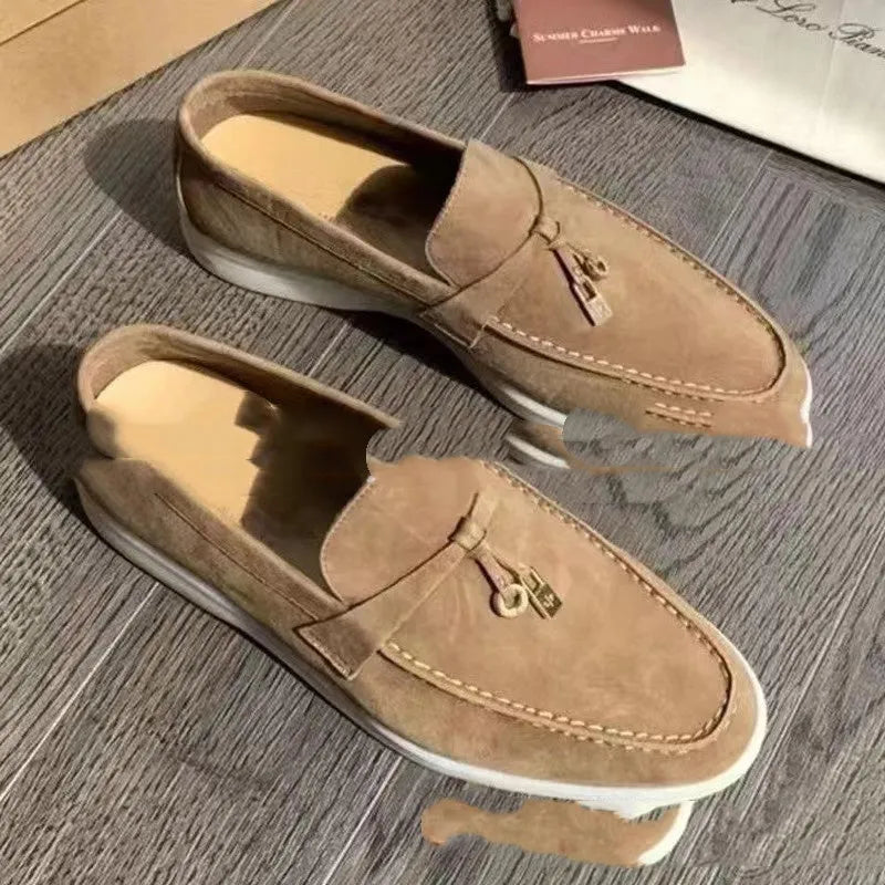 High top slip-on loafers with round toe cap and visible stitching on artificial PU upper