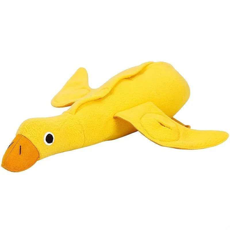 Yellow rubber duck dog toy with squeaker and treat compartment for puppy training and teething.