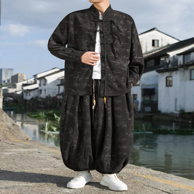 Chinese style men's corduroy casual pants in brown, cotton blend fabric, side view on model.