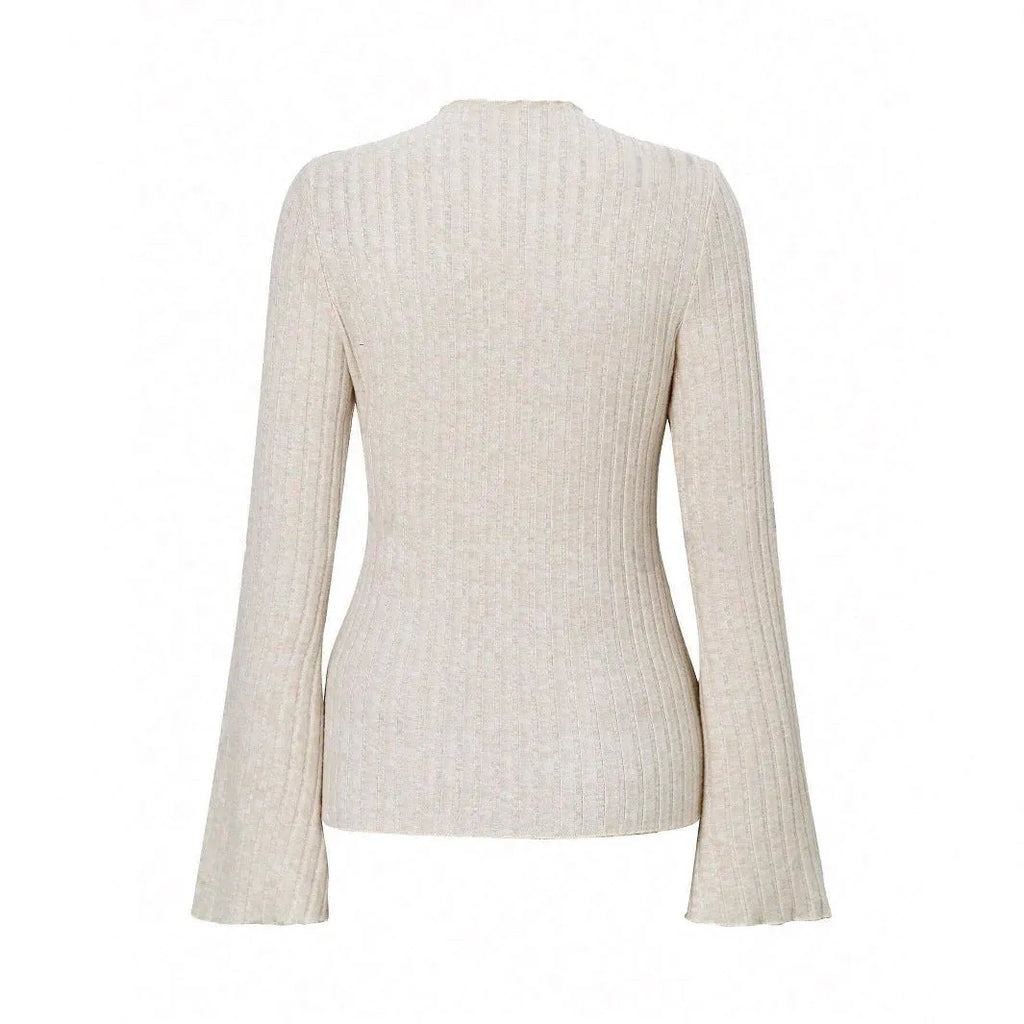 A black long sleeve round neck top with lantern sleeves and a slim fit, showcasing a brushed polyester fabric.