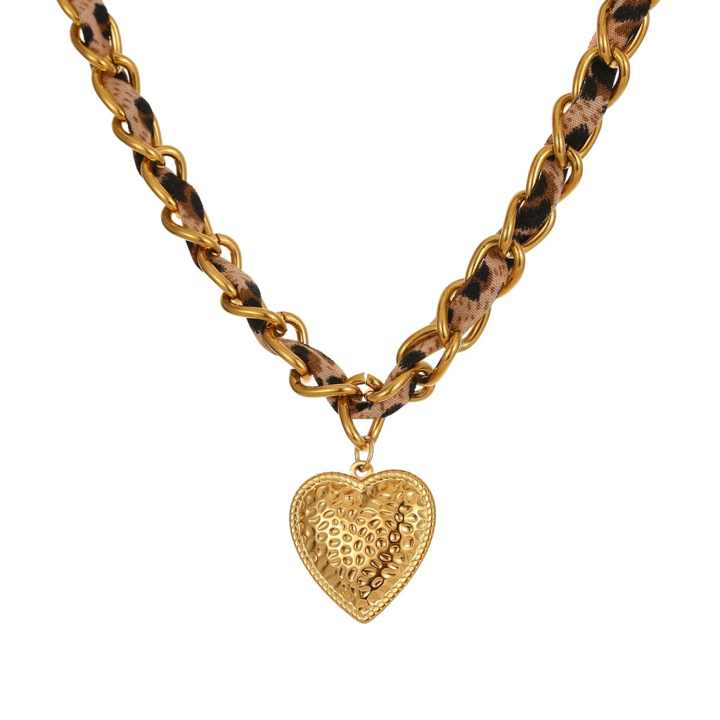 Geometric leopard love pendant necklace on a stainless steel chain with 18K gold electroplate.