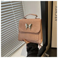 Women's preppy style PU backpack handbag with bow detail in light blue colour