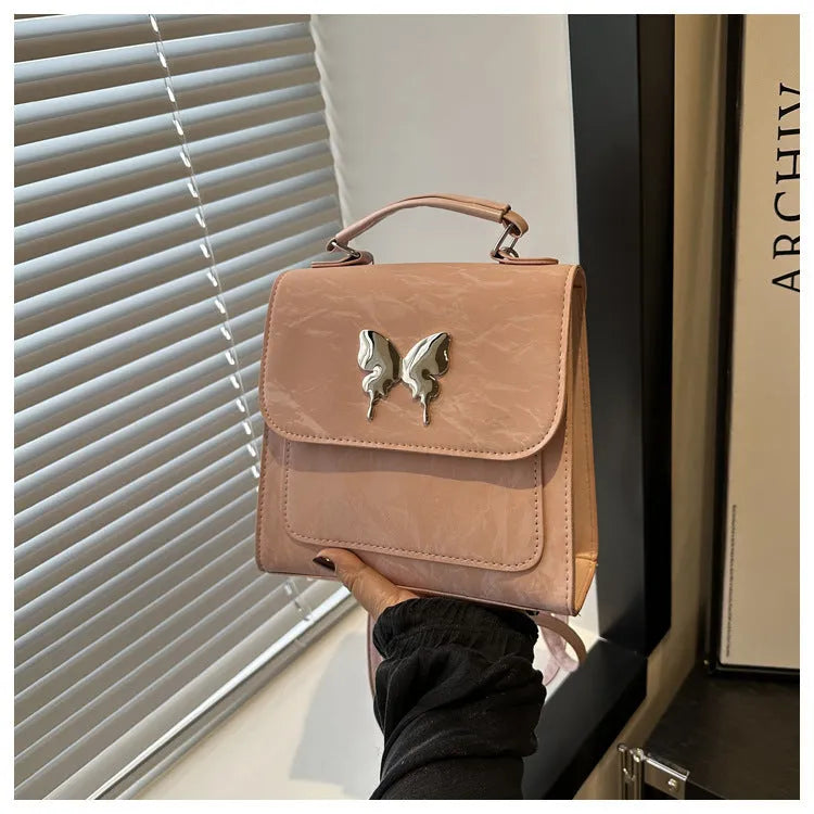 Women's preppy style PU backpack handbag with bow detail in light blue colour
