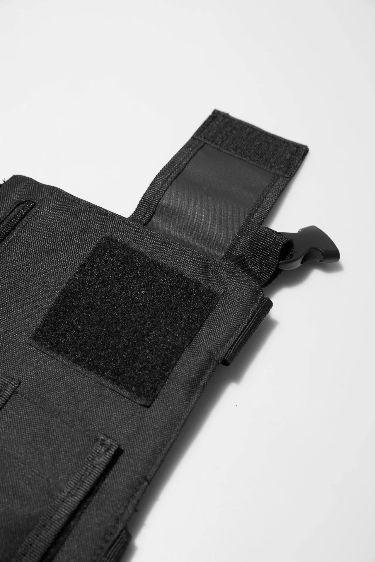 Black tactical tooling chest bag for men with Oxford cloth, striped pattern, and nylon lining