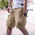 Men's loose-fit cotton blend summer shorts in army green colour on a hanger.