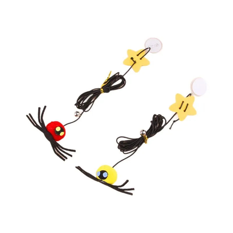 Red and yellow hanging cat toy with elastic rope, feather ball, bell and spider attachment for door mounting