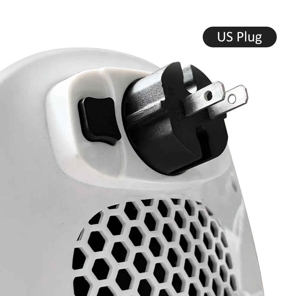 White plastic ceramic heating electric heater with remote control on a table