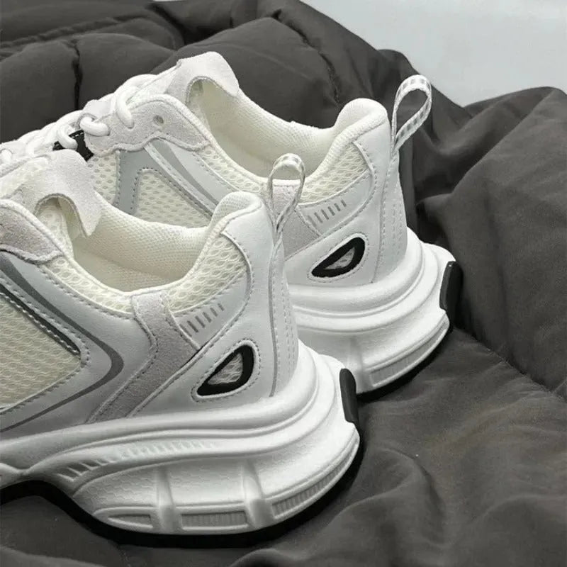 Beige mesh platform casual sports shoes with a wedge heel and front lace-up design on a rubber sole.