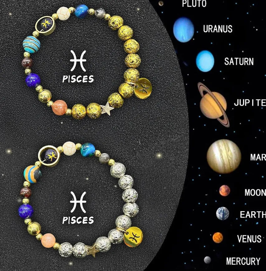Pair of natural stone beaded bracelets showing different zodiac sign designs on a table.