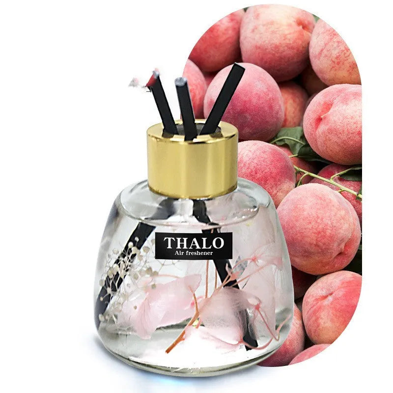 Glass bottle car perfume ornament for vehicle aromatherapy in decorative design.