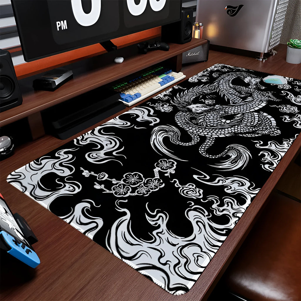 Large cloth gaming mouse pad with detailed flower dragon design and non-slip rubber base.