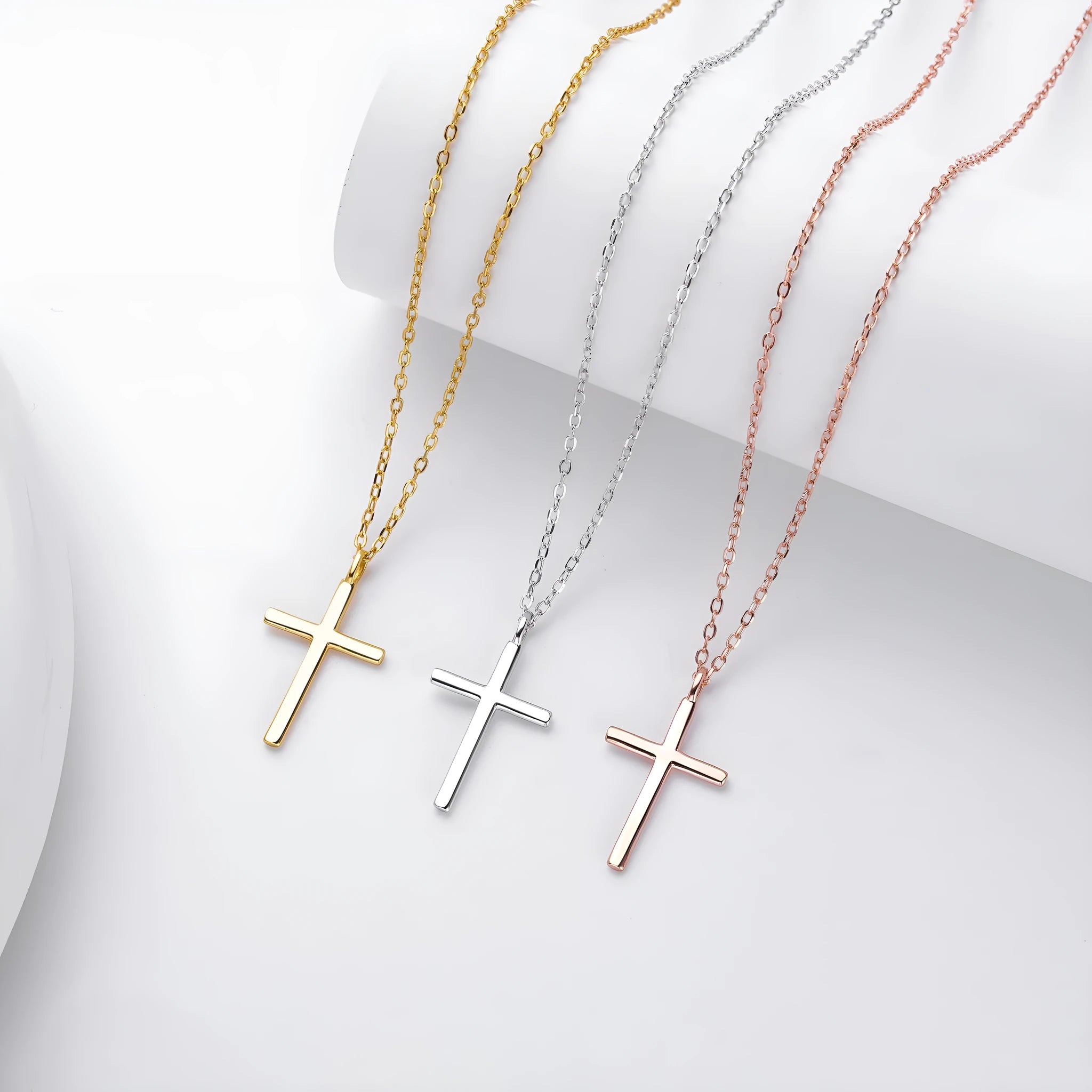 S925 sterling silver cross pendant necklace on an adjustable O-chain, shown in gold plated finish.