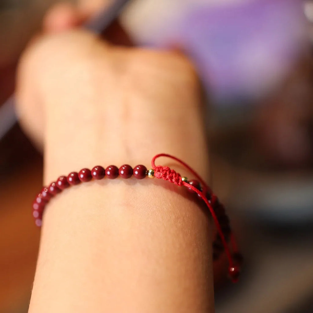 Handcrafted cinnabar bracelet with purple-gold sand geometric design, traditional Chinese style women's jewellery