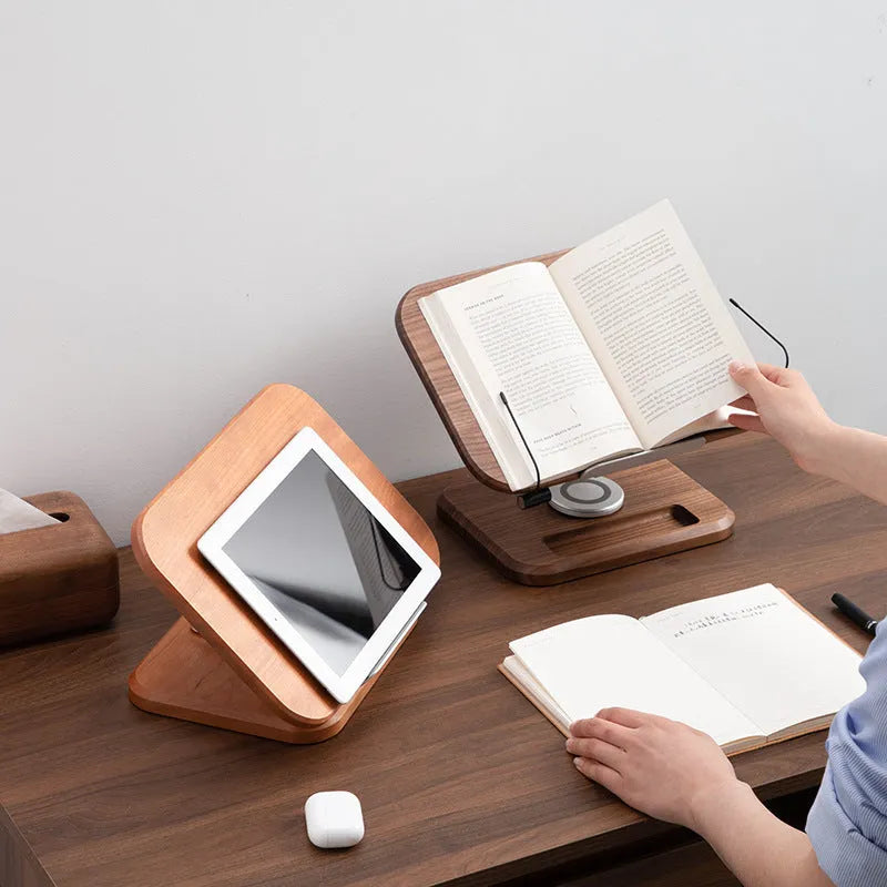 Adjustable walnut-coloured solid wood reading rack holding a book at an angle.