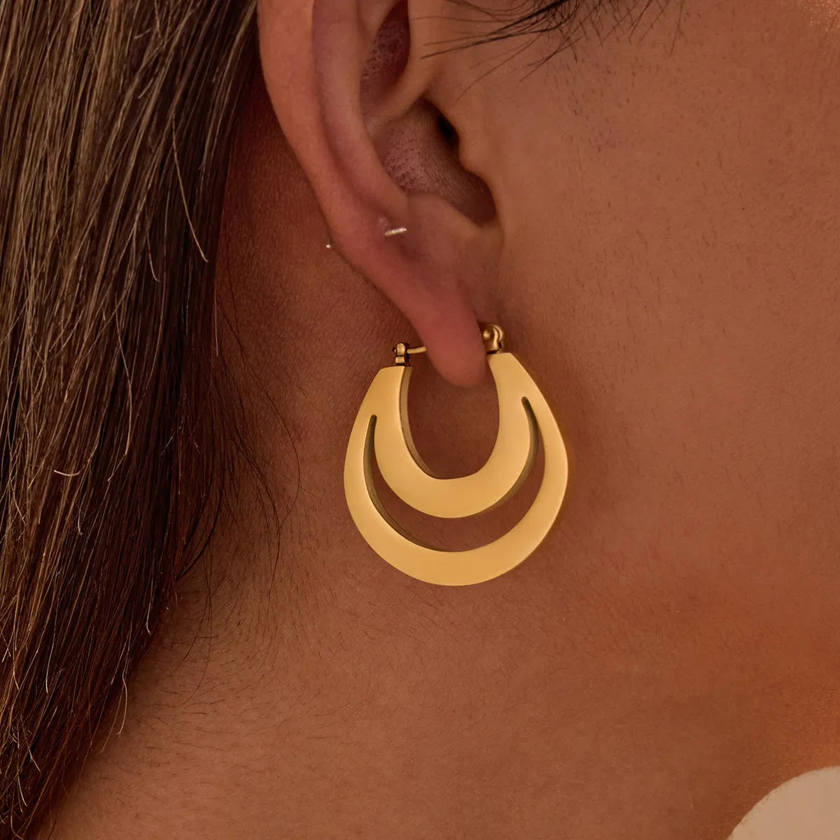 Gold plated geometric French earrings with round ring design on stainless steel with 18K purity plating