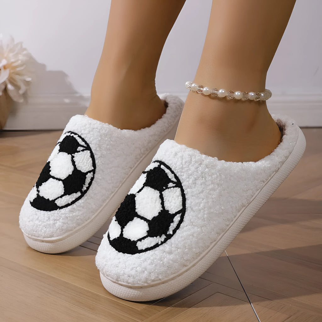 White thermal cotton slippers with ethnic totem pattern, plush upper, and TPR sole on a floor