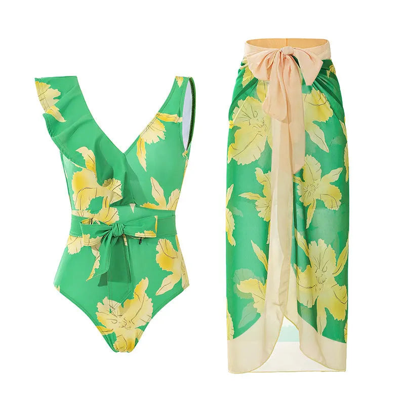 Women's solid colour one-piece swimsuit with spaghetti straps and a separate skirt.