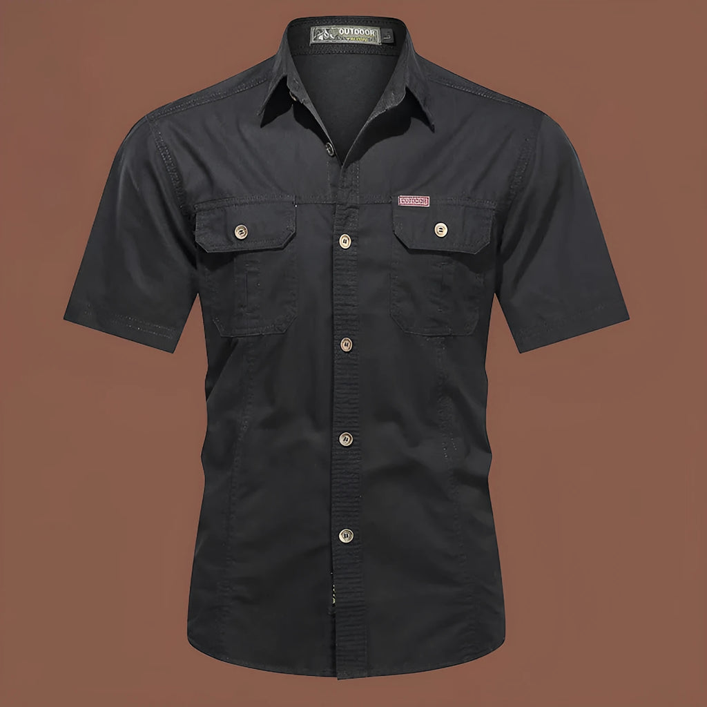 Men's army green short sleeve cotton work shirt with a loose cardigan fit on a hanger.