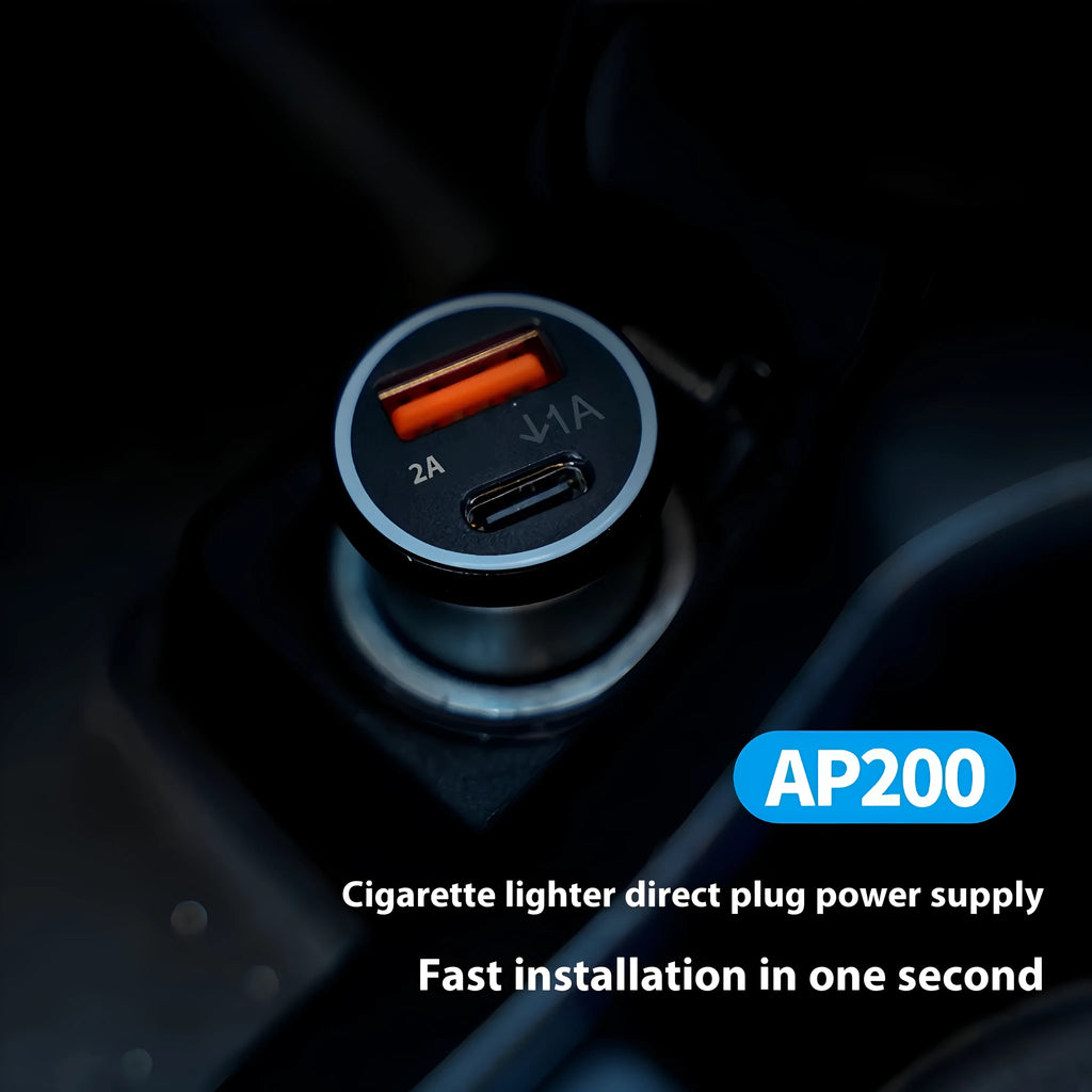 Black car GPS locator with a 12V cigarette lighter plug and a coiled 1.5-metre power cable on a dark surface.