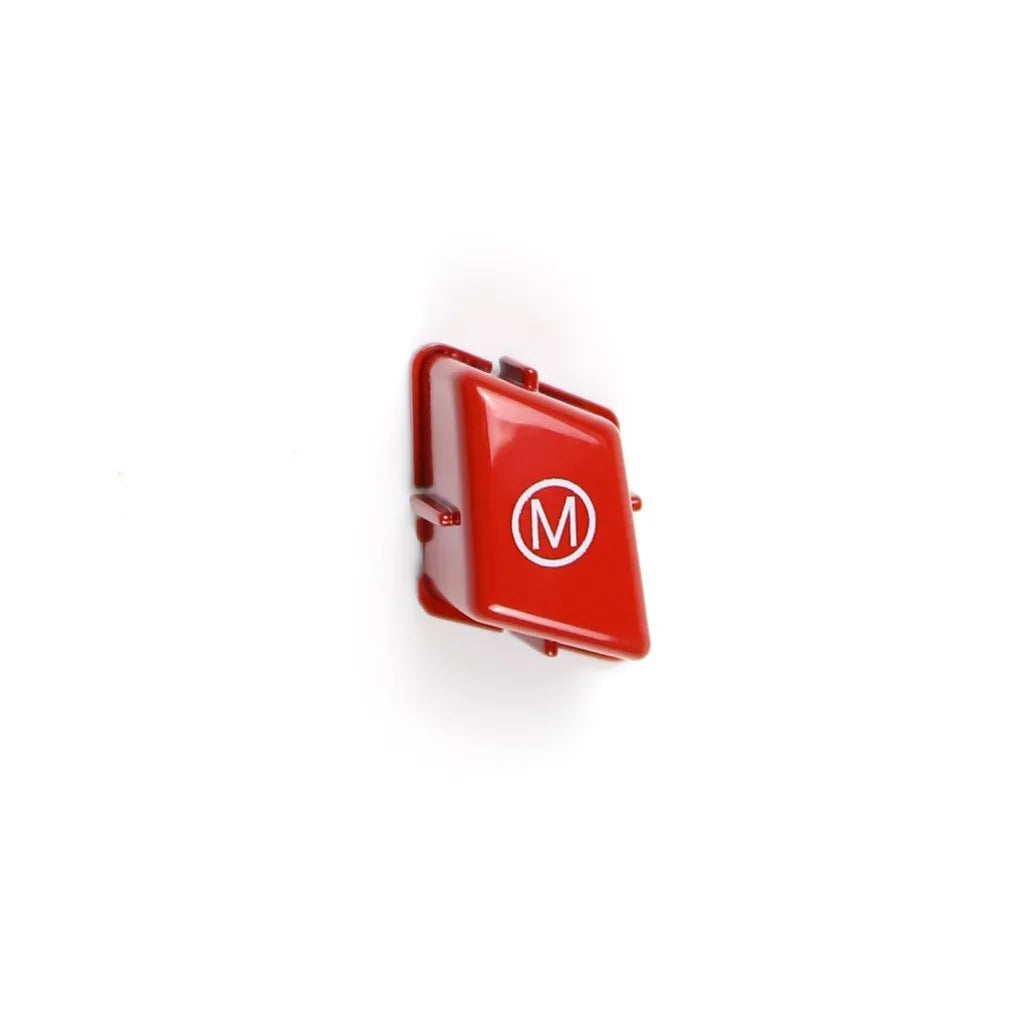 Pair of red and blue BMW M1 and M2 steering wheel mode buttons on a white background.