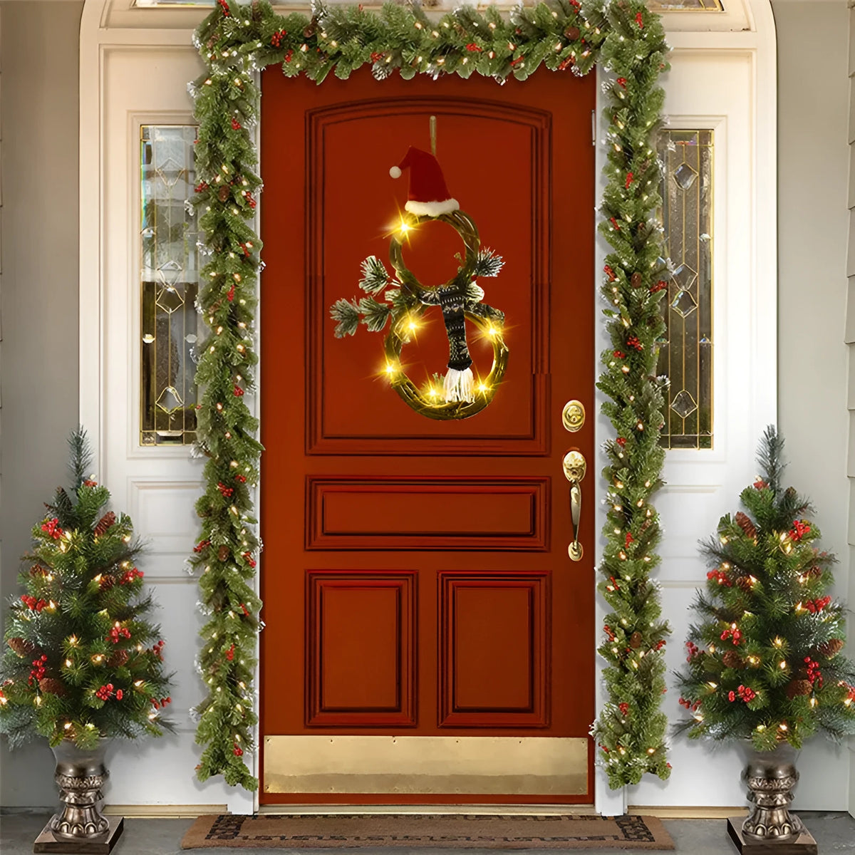 Christmas wreath made of pine needles on a vine circle base in red and grey colours for door decoration