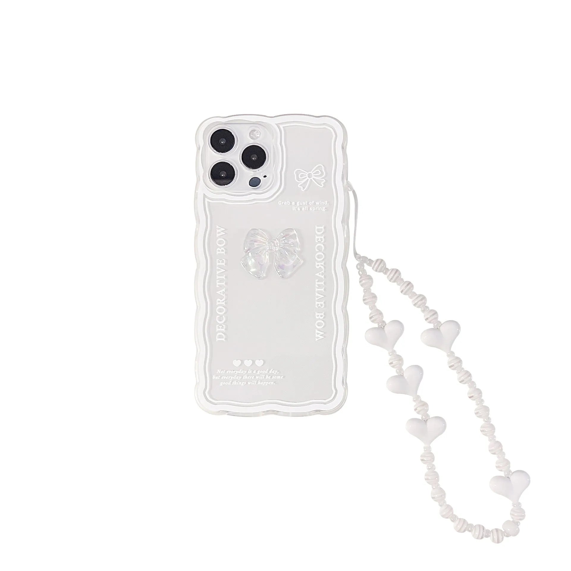 Clear iPhone case with a raised ice bow design, shown next to a white phone lanyard.
