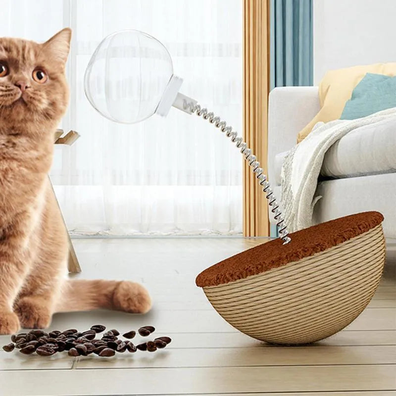 Auto-balancing cat interactive food puzzle toy in tumbler style on a floor