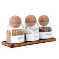 Three transparent glass spherical food storage tanks arranged on a shelf with modern simple design