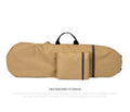 Lightweight waterproof nylon skateboard bag in camouflage colour, shown with longboard and fishing rod.