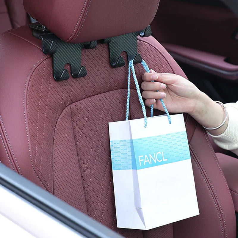 Black ABS car hook bracket with integrated mobile phone holder for rear seat organisation