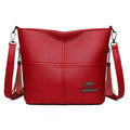 PU crossbody bag in red with stitching and tassels, horizontal shape, large capacity