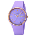 Women's silicone strap quartz watch with 42mm dial and calendar on a wrist, showing light blue colour option.