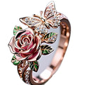 Adjustable colourful alloy ring with drip oil finish, featuring flower, insect, and leaf designs in a fairy style.