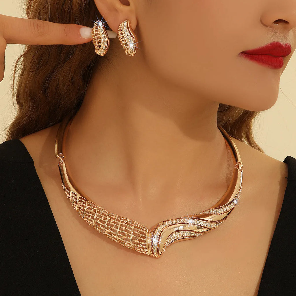 Gold-tone alloy necklace and earrings set for women with heart, water drop and bell motifs