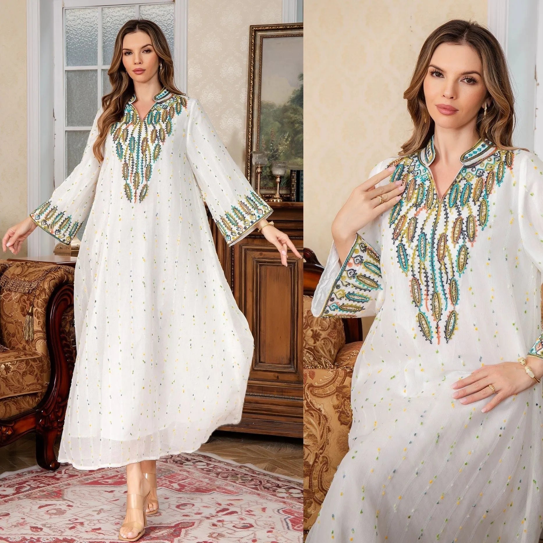 White long sleeve Arabic robe abaya on a hanger, full-length polyester maxi dress.