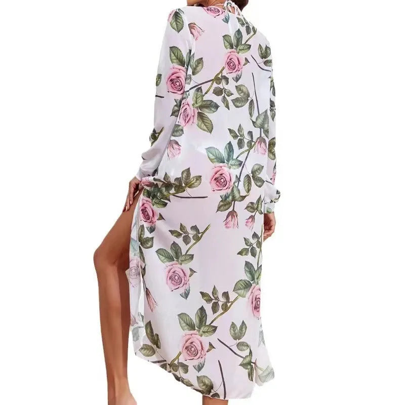 Women's three-piece printed bikini set in white pattern with sun protection blouse, bra, and shorts on a model