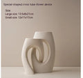 Ceramic soft vase second generation, handmade glazed, white large size on a table as decorative centrepiece