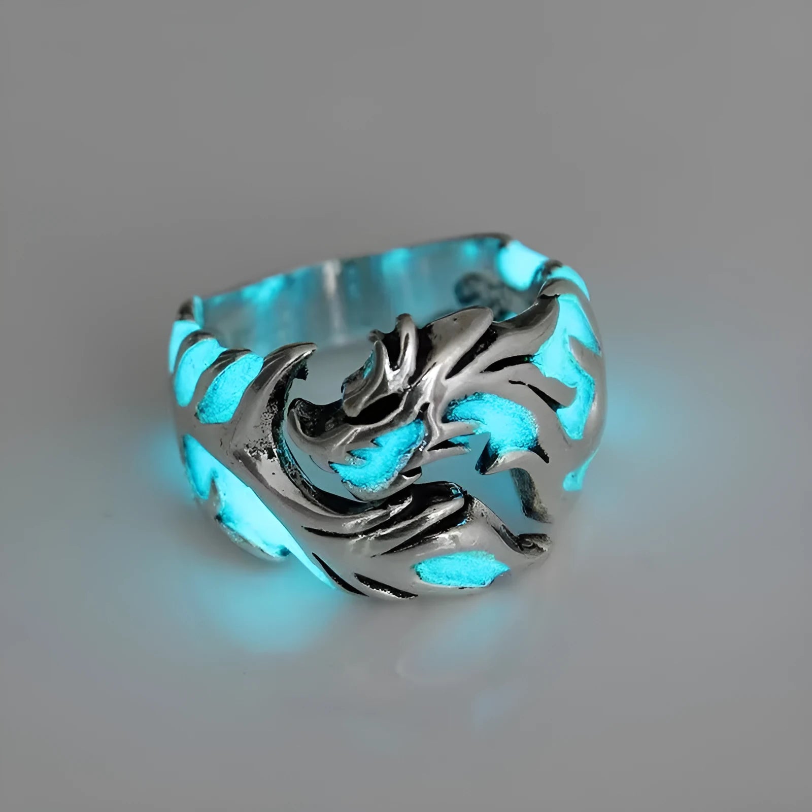 Adjustable opening Chinese style ring with luminous dragon pattern in antique silver blue and green.