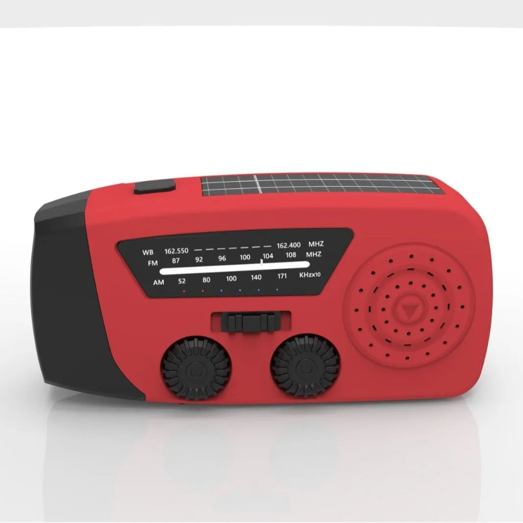 Red rechargeable emergency radio torch with flashlight, measuring 13.3 x 6.3 x 5.2 cm with wrist strap