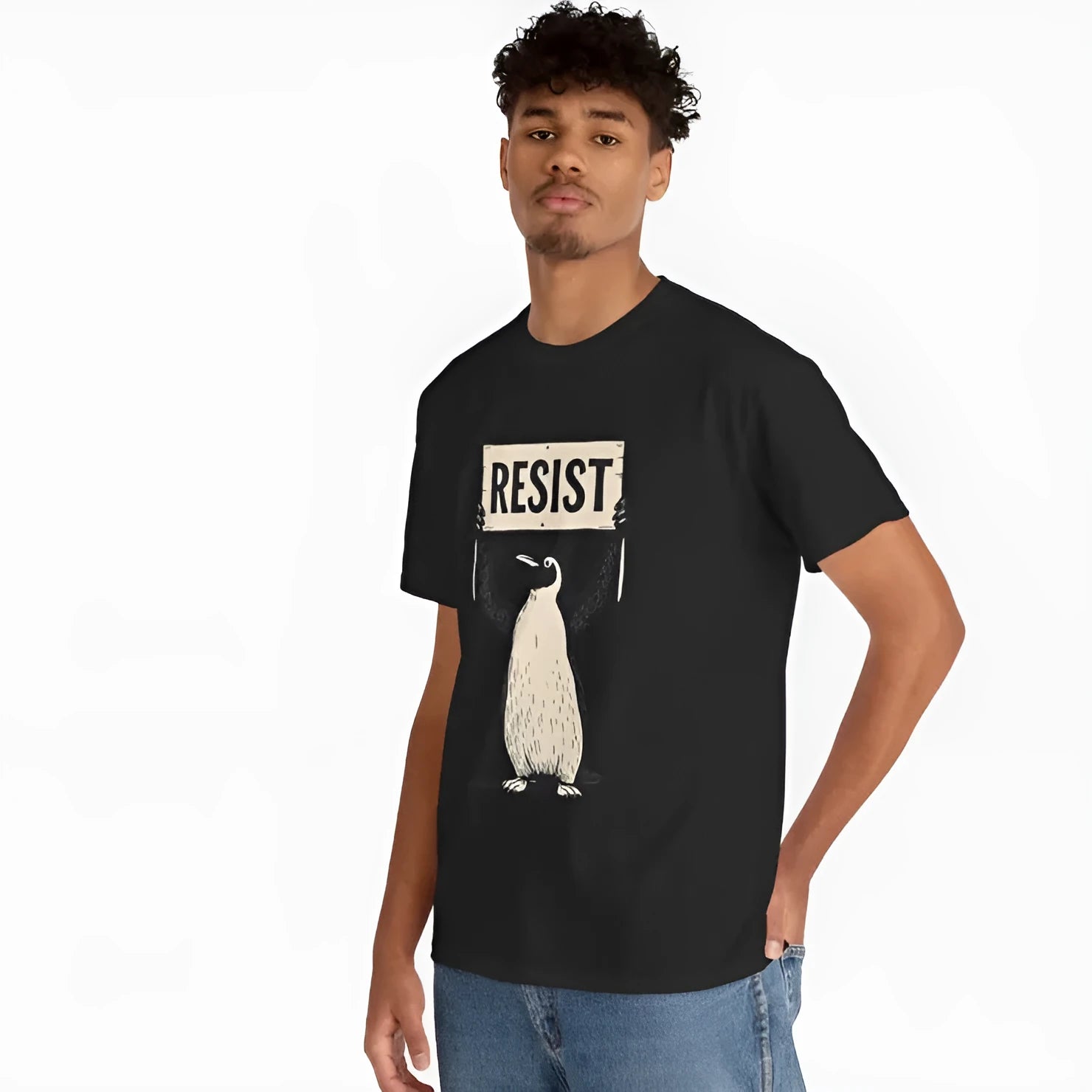 A loose-fitting black short-sleeve cotton t-shirt with a round neck on a hanger.