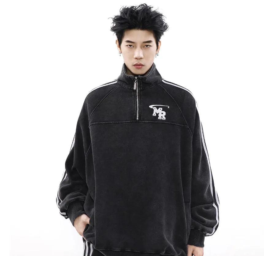Black Hong Kong style retro hoodie with a stand collar on a hanger