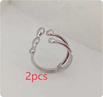 Brass spherical ring for women in gold or silver plating.