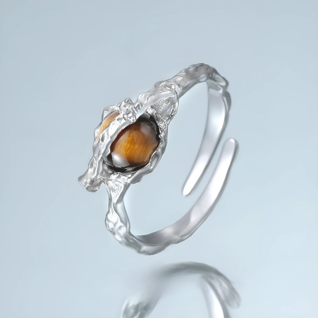 Silver Saturn open ring with tigereye detail and white gold-coloured electroplated finish, adjustable opening